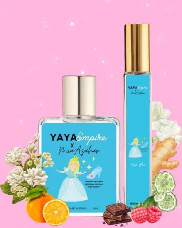 Dua botol perfume Yaya Empire x Mia Azahar Dino Blue berlabel ilustrasi puteri