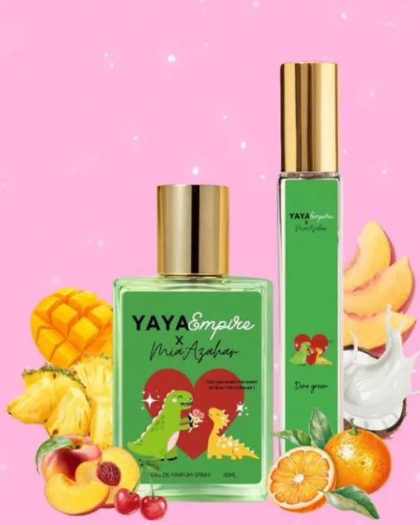 Dua botol perfume Yaya Empire x Mia Azahar Dino Green berlabel ilustrasi dinosaur